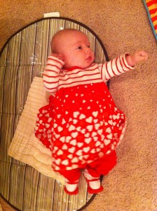 Wearing her Valentine's outfit.