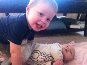 Ethan loving on his sister.