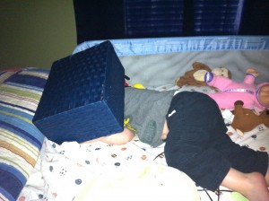 Ethan took out his sock drawer, emptied it, and then decided to put it on his head?  