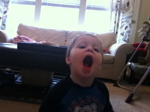 I told him to smile and he showed me his mouth full of chewed up crackers.  