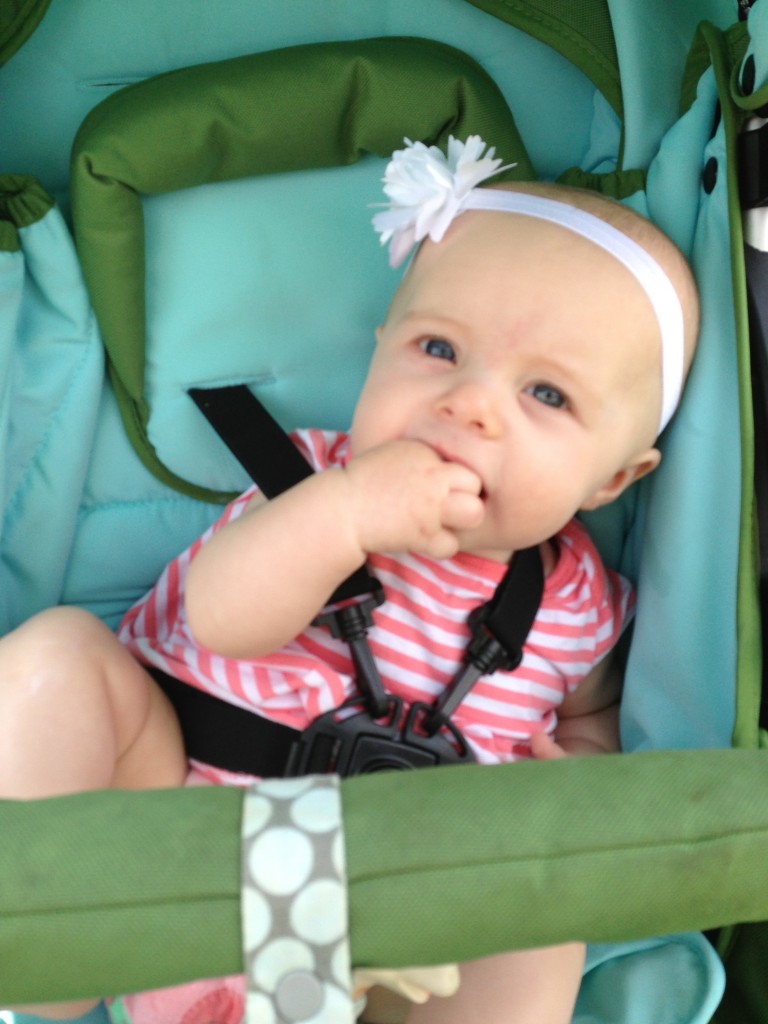 Noelle's preferred position in the stroller.  Don't try to recline her!