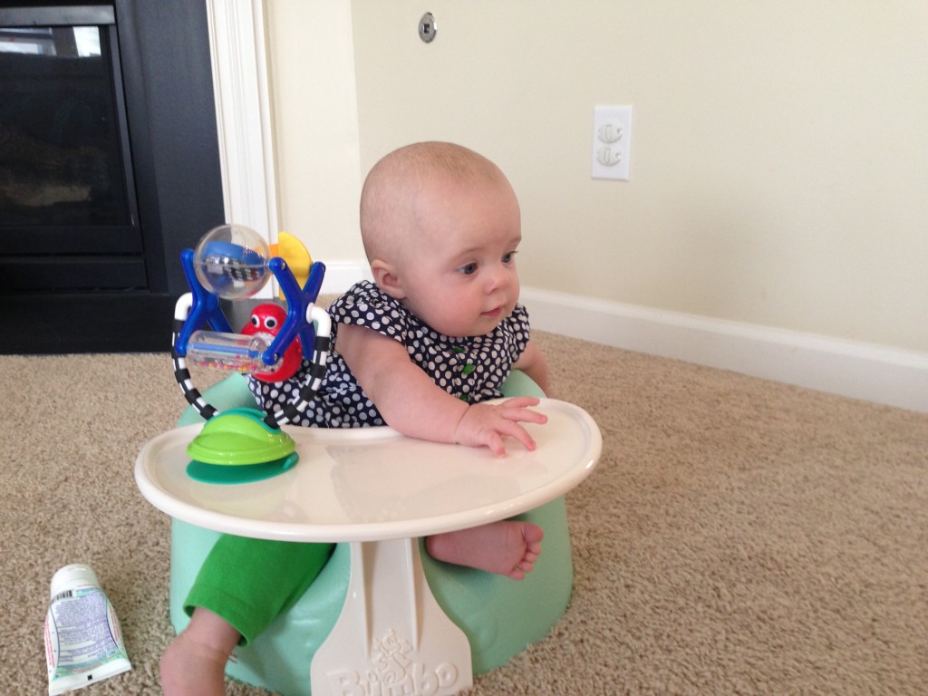 She never sits straight in her bumbo.