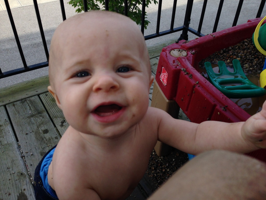 Getting dirty with her brother on the rock box