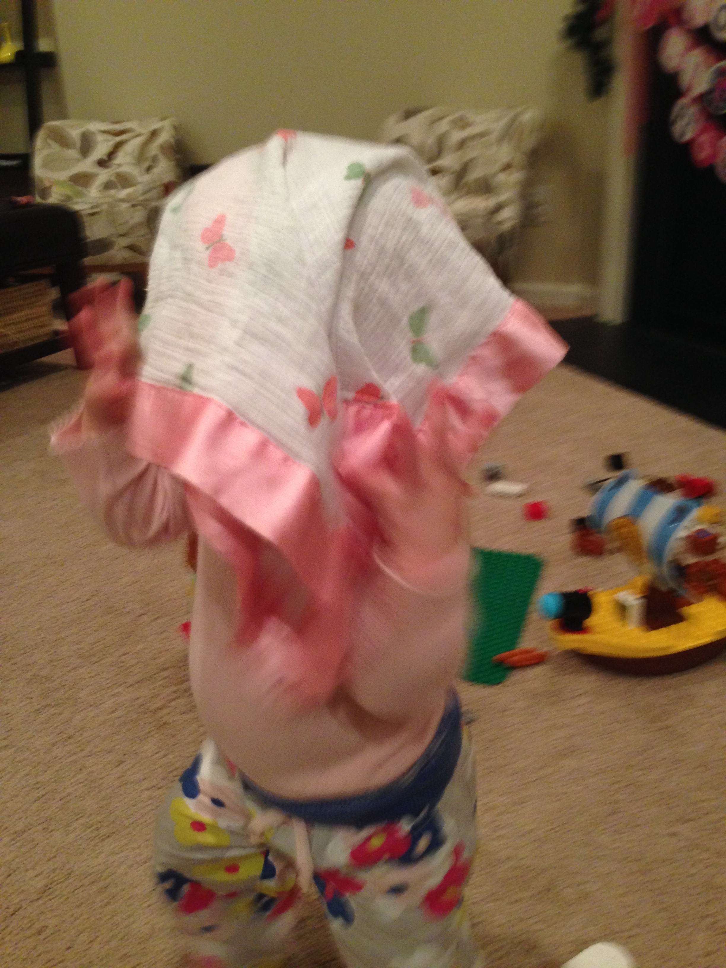 Peek a boo - her favorite game right now.