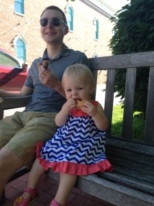 Enjoying a donut with Daddy.  She doesn't mess around when it comes to sweets.