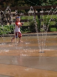 Playing at the splash park.