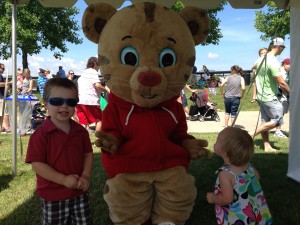 Meeting Daniel Tiger at PBS kids in the park.