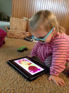 Playing the iPad in glasses - totally normal.